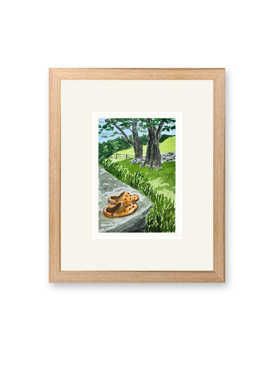Dew on crocs, line and watercolor painting shown in its frame